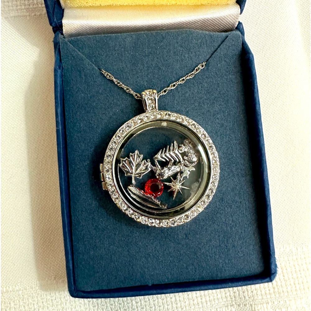 Locket with Canadian charms.
